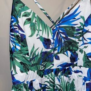 Brand new fashion nova dress. long dress, cross straps on the back. never worn